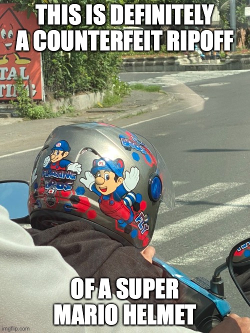 Super Mario Helmet | THIS IS DEFINITELY A COUNTERFEIT RIPOFF; OF A SUPER MARIO HELMET | image tagged in helmet,super mario,memes | made w/ Imgflip meme maker