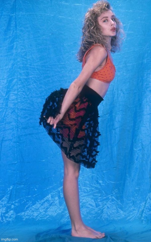 Young Kylie in skirt | image tagged in kylie young,skirt,young,singer,cute girl,1980s | made w/ Imgflip meme maker