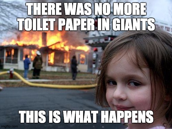 Disaster Girl | THERE WAS NO MORE TOILET PAPER IN GIANTS; THIS IS WHAT HAPPENS | image tagged in memes,disaster girl | made w/ Imgflip meme maker