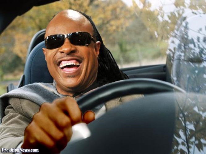 Stevie Wonder Driving | image tagged in stevie wonder driving | made w/ Imgflip meme maker