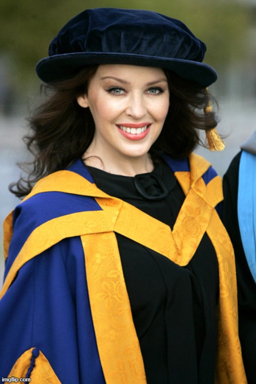 Receiving an honorary degree in 2011 for promoting breast cancer awareness. | image tagged in kylie college,breasts,cancer,college,degree,charity | made w/ Imgflip meme maker