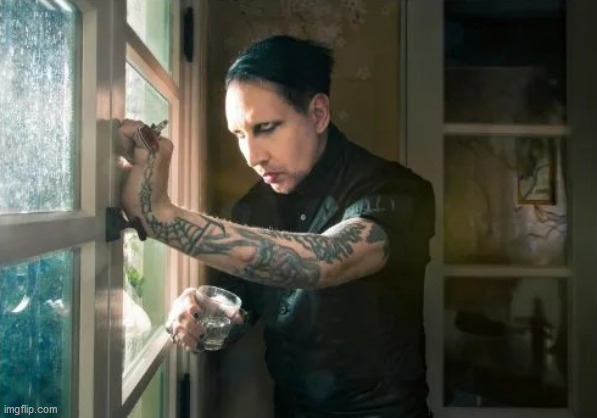 Marilyn Manson waiting | image tagged in marilyn manson waiting | made w/ Imgflip meme maker