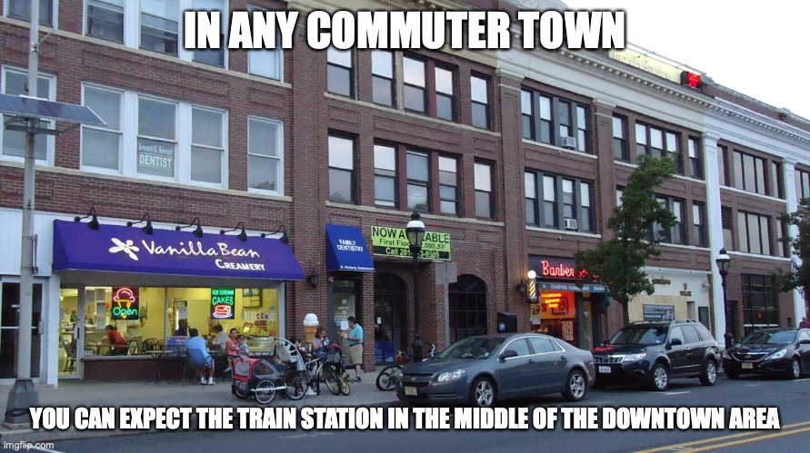 Cranford Downtown Area | IN ANY COMMUTER TOWN; YOU CAN EXPECT THE TRAIN STATION IN THE MIDDLE OF THE DOWNTOWN AREA | image tagged in commuter town,memes,downtown | made w/ Imgflip meme maker