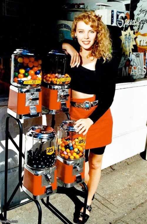 Young Kylie with those awesome retro quarter candy machines | image tagged in kylie young,retro,young,awesome,nice,cute girl | made w/ Imgflip meme maker