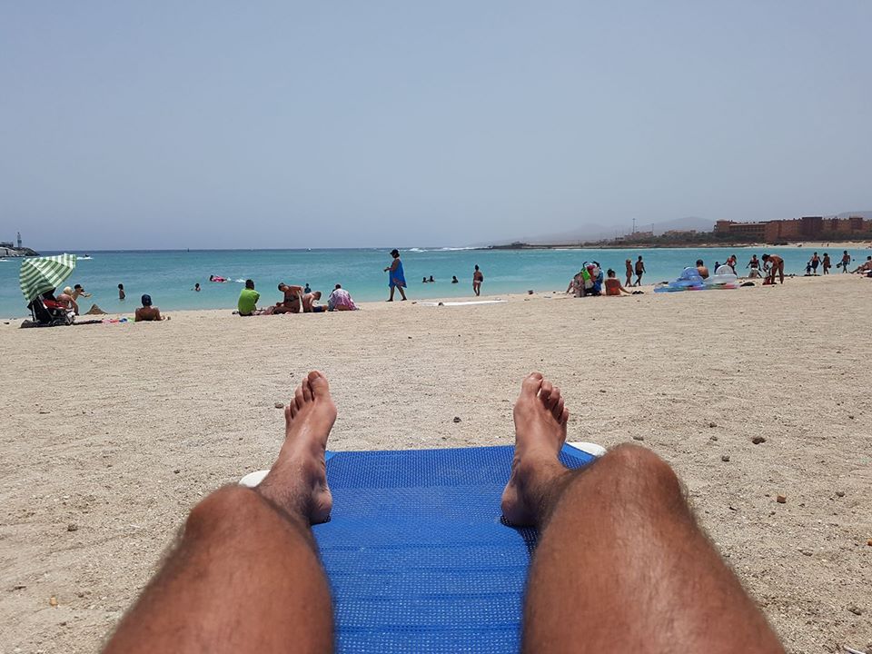 hairy legs sunbathing beach Blank Meme Template