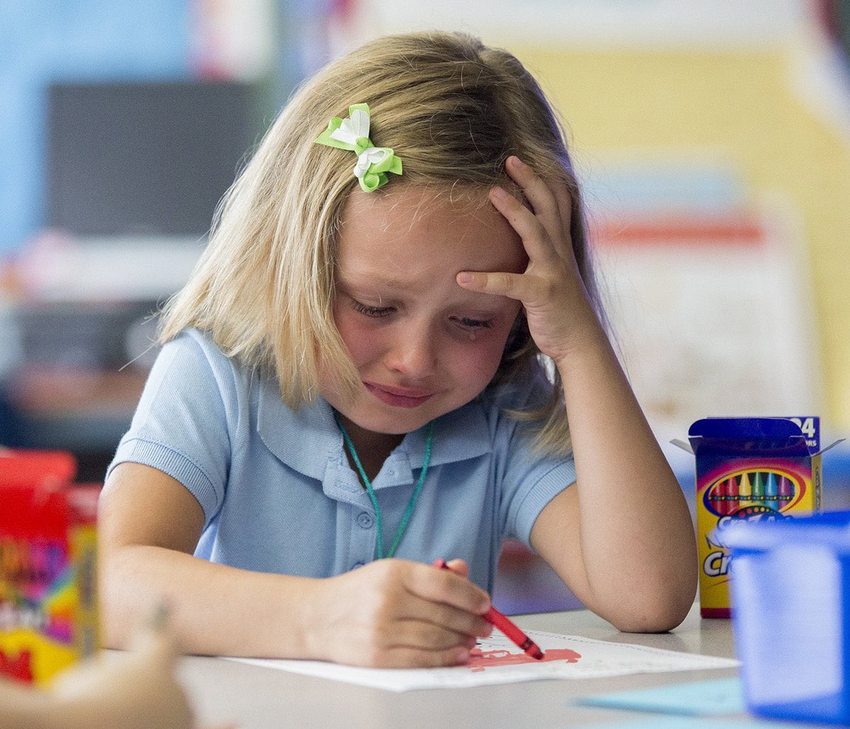 kid crying doing homework