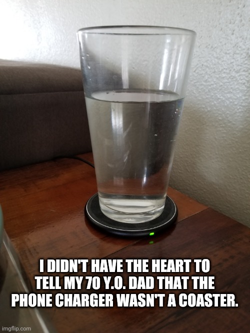 Old people and technology | I DIDN'T HAVE THE HEART TO TELL MY 70 Y.O. DAD THAT THE PHONE CHARGER WASN'T A COASTER. | image tagged in old people,technology challenged grandparents | made w/ Imgflip meme maker