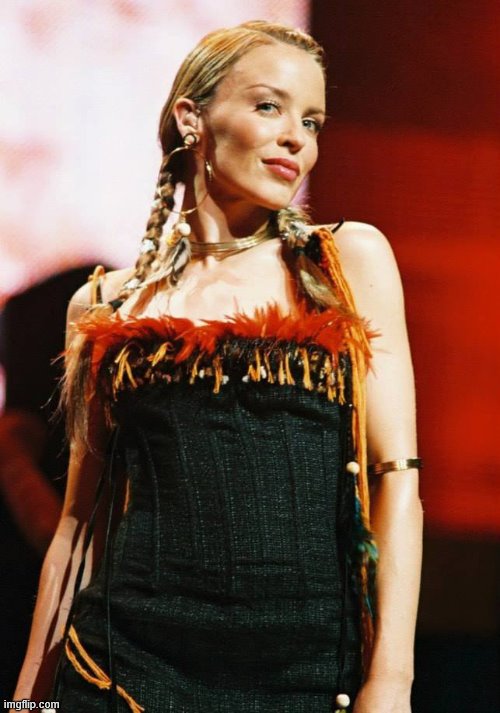 Fever tour (2002). She definitely got that braided look from Britney. | image tagged in kylie fever tour,britney spears,performance,pop music,singer,style | made w/ Imgflip meme maker