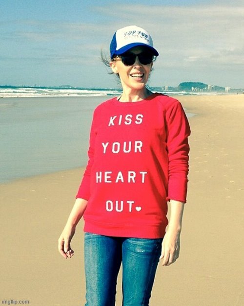On the beach. Kiss your heart out. | image tagged in kylie kiss,day at the beach,sunglasses,heart,kiss,beach | made w/ Imgflip meme maker