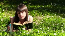 Woman Reading Book in Field of Flowers Meme Template