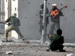 Libyan soldier with guitar Meme Template