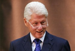 bill_clinton_laughing_glasses Meme Template