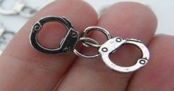 tiny handcuffs Meme Template