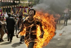 Tibetan running on fire Meme Template