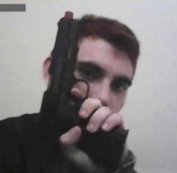 Nikolas Cruz holding a gun Meme Template