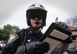 Motorcycle Cop Writting Up A Ticket Infrigement Meme Template