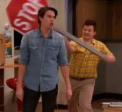 Gibby hitting Spencer with stop sign Meme Template