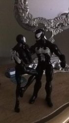 Tom Hardy as Venom choking Topher Grace as Venom. Meme Template