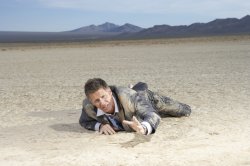 crawling man in desert Meme Template