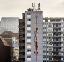 Building murals in Brussel showing children sacrificing. Meme Template