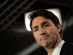 Justin Trudeau smugly smirking Meme Template