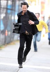 Keanu Reeves running away with camera Meme Template