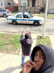 Kid flipping off cops Meme Template