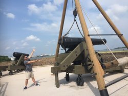 Guy next to giant cannon at Old Fort Jackson Meme Template
