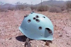 Bullet holes in blue helmet Meme Template