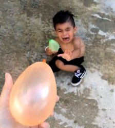 Kid scared of balloon Meme Template