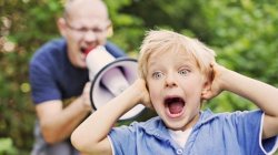 man yelling at a child using a bullhorn Meme Template