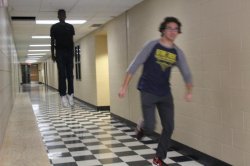 Guy running away from floating boy Meme Template