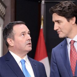 Jason Kenney Looks Up to Justin Trudeau Meme Template