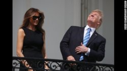 Trump looking at the eclipse Meme Template