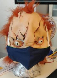 Chucky wears his mask Meme Template