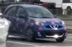 Blue Nissan Micra with pink polka dots Meme Template