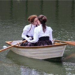 Two girls kissing on a boat Meme Template