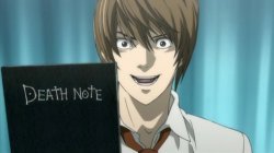 Light holding the Death Note Meme Template
