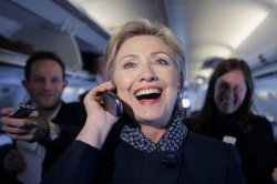 Excited Hillary Clinton on phone during campaign Meme Template