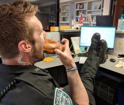 Cop Eating Donut with Feet on Desk Meme Template
