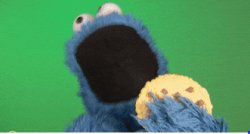 Cookie monster munching on "your text here" Meme Template