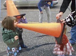 Girl yelling at her sister in a cone Meme Template