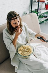 Jesus eating popcorn and watching tv Meme Template