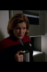 Serious Janeway drinking coffee Meme Template