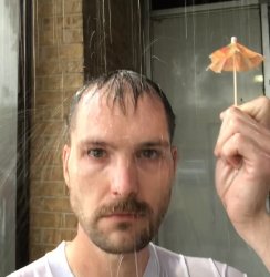 Man with tiny umbrella geting rained on Meme Template