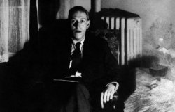 H P Lovecraft sitting Meme Template