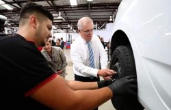 ScoMo changing a tyre Meme Template