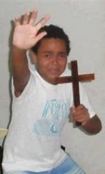 kid holding cross Meme Template