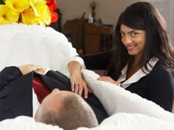 Weird stock photos 7 suspicious woman at coffin of dead man Meme Template