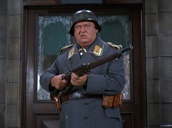 Schultz from Hogan's Heroes with gun 2 Meme Template